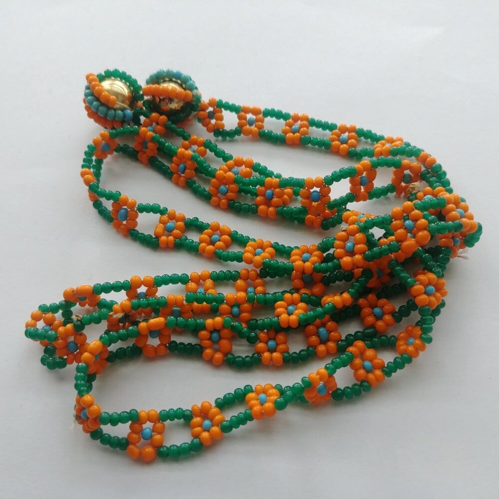 4/$20 Long beaded strand orange flowers green and blue tie necklace